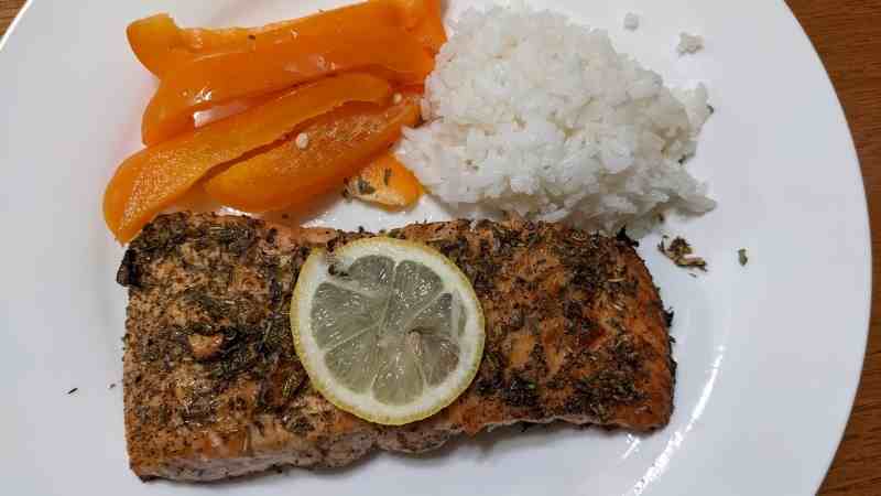 Baked Salmon withe sides of rice and bell pepper
